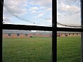 Blick durch ein Barackenfenster (Auschwitz II).jpg